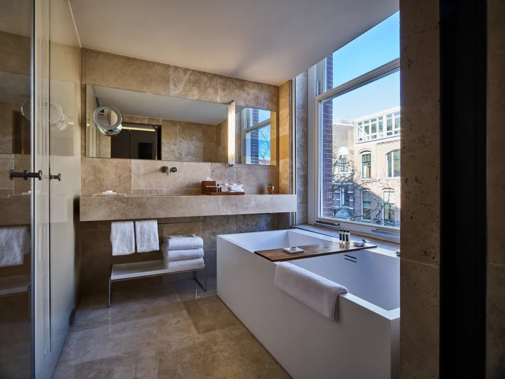 Amsterdam conservatorium luxury bathroom bathtub with a view